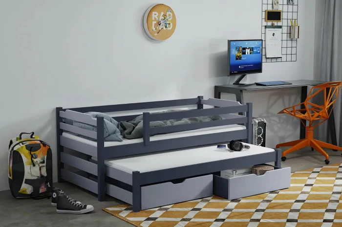 Dunkelblaues Funktionsbett mit zweiter Schlafgelegenheit und Stauraum für das Kinderzimmer.