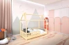 Modernes Kinderzimmer mit Hausbett aus Holz, Berg-Wandbild und Schränken in Rosa und Weiß.
