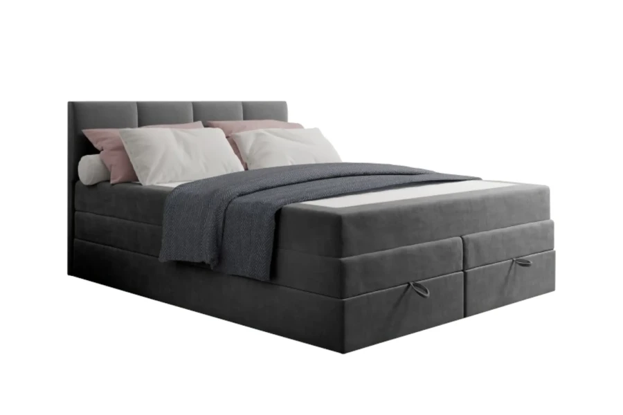 Dunkelgraues Boxspringbett mit Stauraum und gemütlicher Bettwäsche auf weißem Grund.