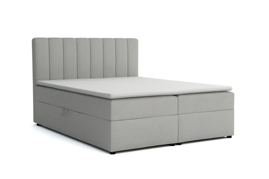 Hellgraues Boxspringbett mit Bettkasten und gestepptem Kopfteil