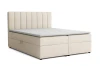 Cremefarbenes Boxspringbett mit Bettkasten und gestepptem Kopfteil vor weißem Hintergrund.