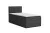 Dunkelgraues Boxspringbett mit quadratisch gestepptem Kopfteil und Topper.