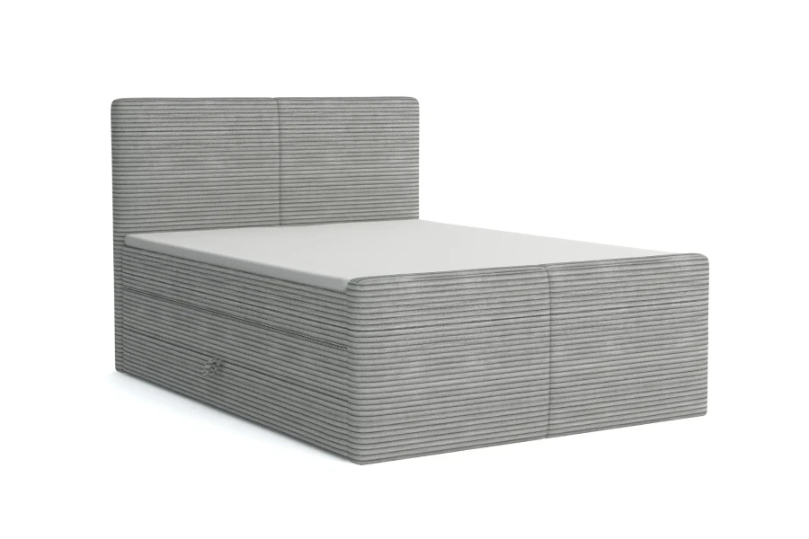 Modernes hellgraues Boxspringbett mit Cord-Bezug auf weißem Hintergrund.