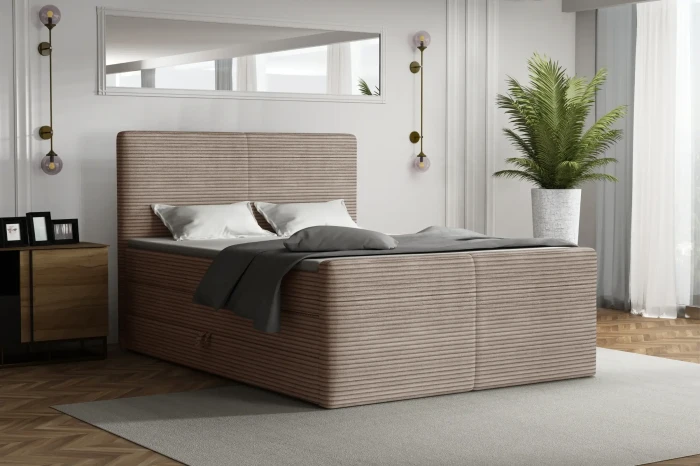Beiges Boxspringbett Rocky in Cord-Optik in einem modern eingerichteten Schlafzimmer-Ambiente.