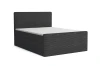 Anthrazitfarbenes Cord-Boxspringbett mit Kopfteil auf weißem Hintergrund freigestellt.