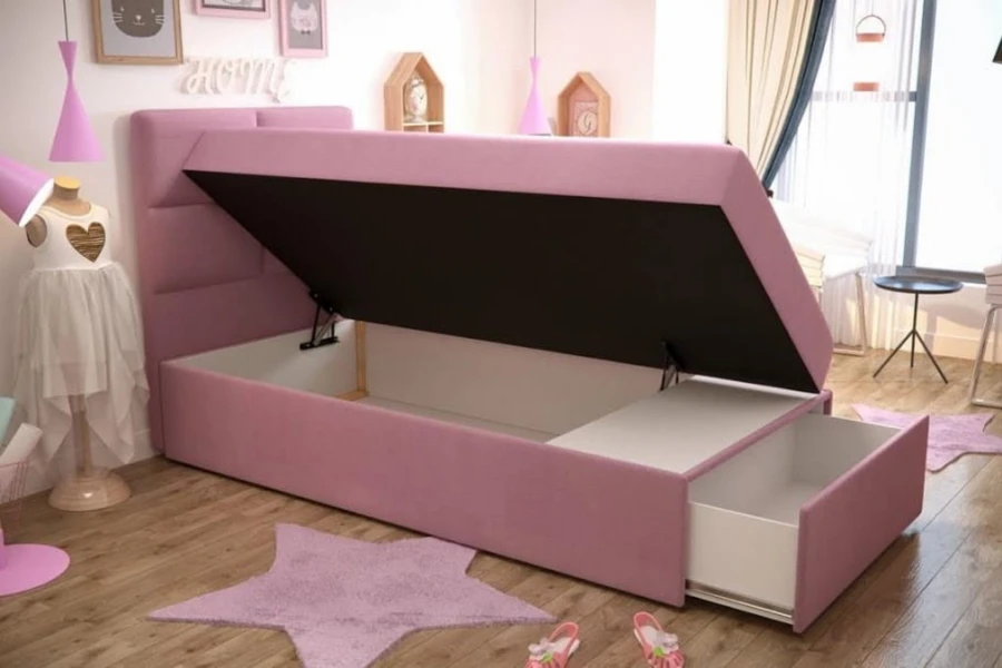 Rosa Jugendbett mit Stauraum: Aufgeklappter Bettkasten und ausziehbare Schublade für mehr Ordnung.