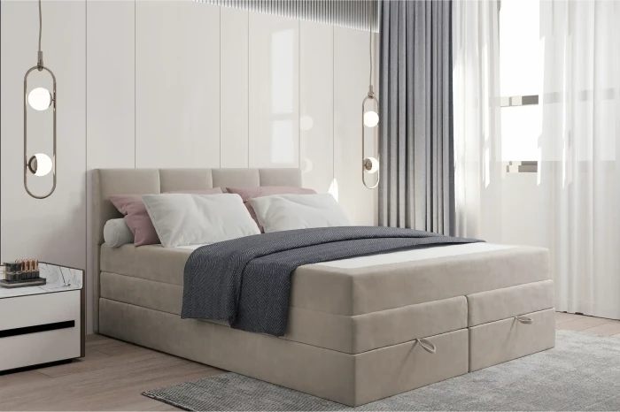 Beiges Polsterbett mit Bettwäsche und Kissen in einem hellen Schlafzimmer.