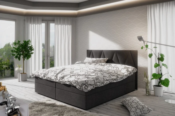 Elegantes Boxspringbett in Anthrazit mit geometrischem Kopfteil-Design im Schlafzimmer.