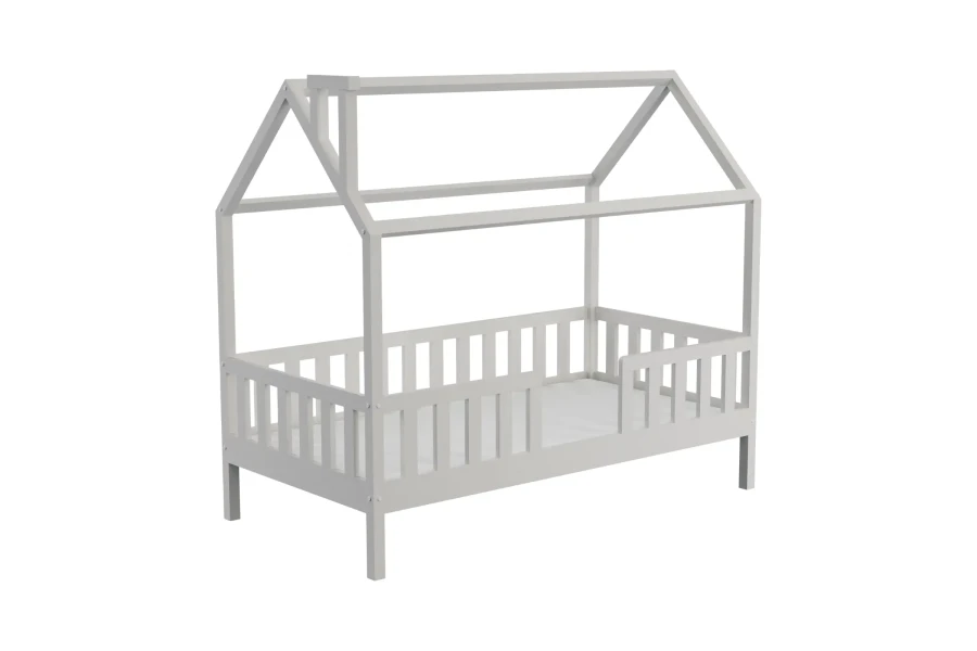 White children's house bed made of wood with chimney and safe fall protection on a white background.
