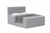 Komfortables Boxspringbett in Grau mit gestepptem Kopfteil und geometrischer Decke