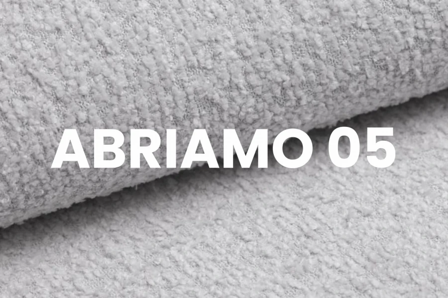 Stoffmuster Abriamo 05 in Grau: Moderner Bouclé-Stoff mit weicher Oberflächenstruktur.