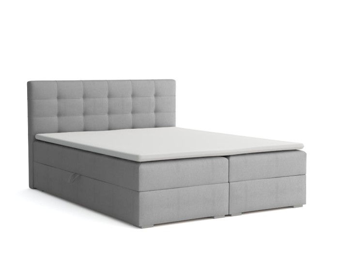 Graues Boxspringbett mit gestepptem Kopfteil und Stauraum, Ansicht von vorne links.
