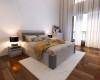 Modernes Schlafzimmer mit gemütlichem Doppelbett, weißem Hochflorteppich und Nachttischen.