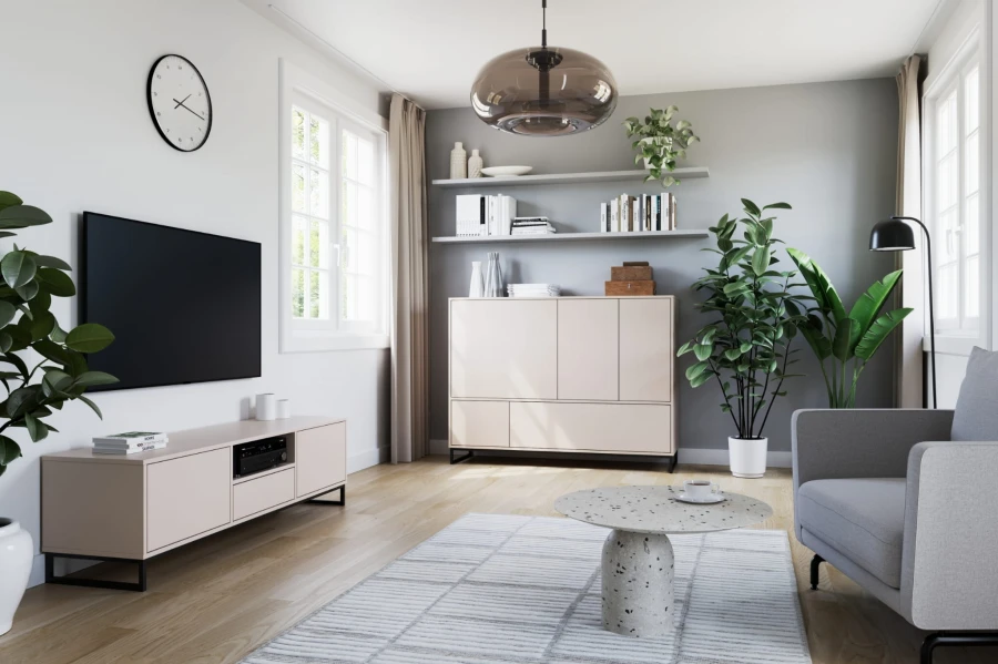Modern eingerichtetes Wohnzimmer mit hellbeigen Möbeln der Geneve Kollektion.