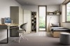 Komplettes Jugendzimmer-Set mit Bett, Schreibtisch und Kleiderschrank in modernem Design.