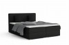Modern boxspring bed in black with grey bedding on a white background.