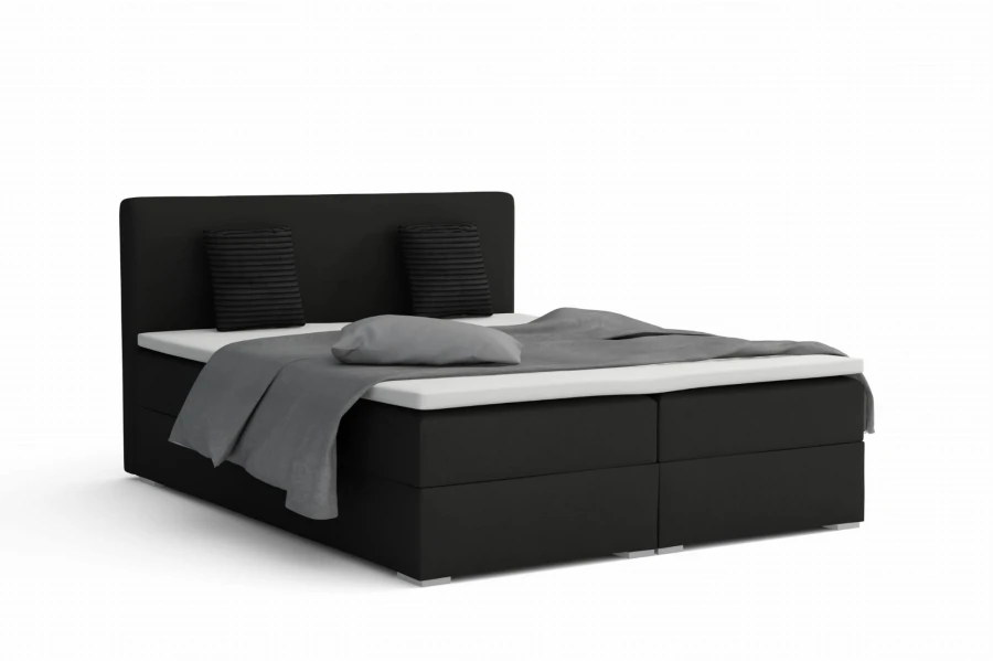 Modern boxspringbed in zwart met grijs beddengoed op een witte achtergrond.