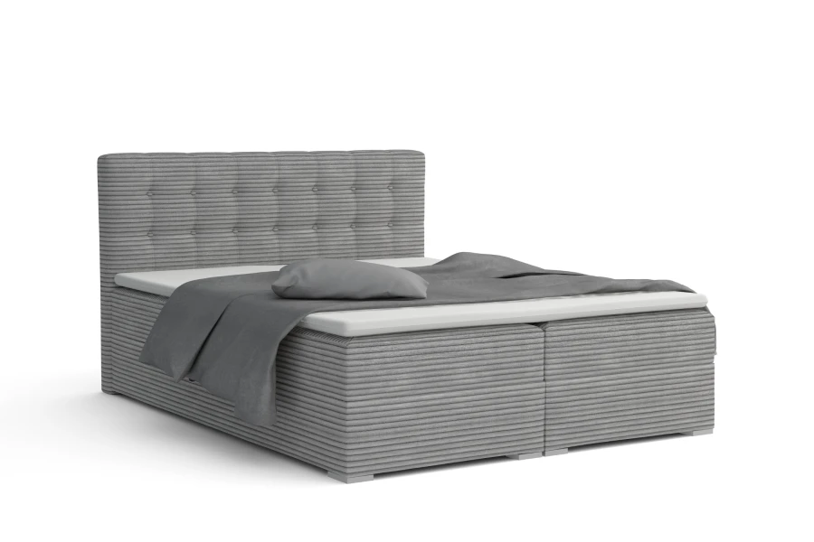 Graues Boxspringbett mit Cord-Bezug und gestepptem Kopfteil, modernes Schlafzimmer-Design.