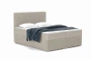 Modernes Boxspringbett in Beige mit Stoffbezug, Kissen und blauer Decke.