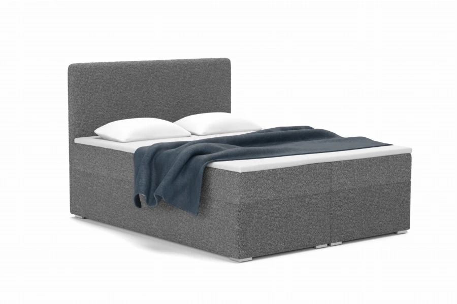 Modernes graues Boxspringbett aus Bouclé-Stoff mit hohem Kopfteil.