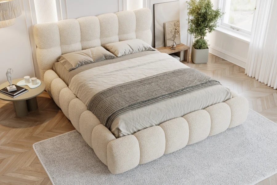 Elegantes Polsterbett in Beige aus Bouclé-Stoff – gemütliches Design für das Schlafzimmer.