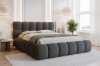 Dunkelgraues Bouclé-Bett in modern eingerichtetem Schlafzimmer