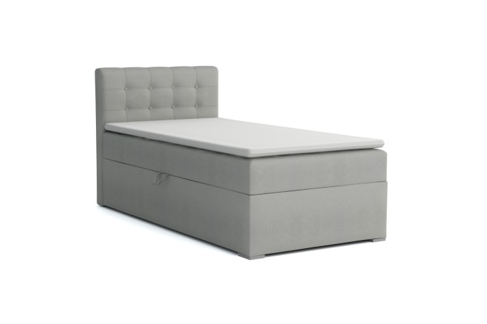 Hellgraues Boxspringbett mit Bettkasten und gestepptem Kopfteil auf weißem Hintergrund.