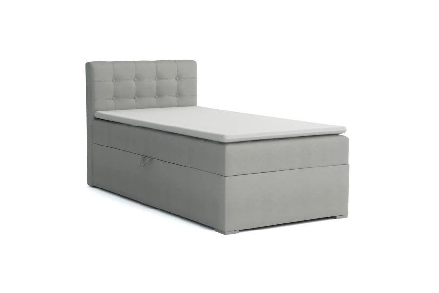 Graues Boxspringbett JUNG III mit gepolstertem Kopfteil und weißem Topper, Einzelbett.