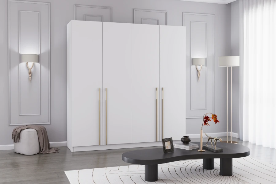 Stilvoller weißer Kleiderschrank mit Goldgriffen in modernem Zimmer-Ambiente.