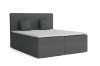 Gepolstertes Boxspringbett in Dunkelgrau inklusive Kopfteil und Topper vor weißem Hintergrund.