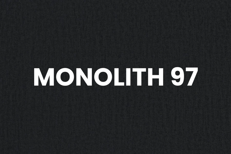 Hoogwaardig stofstaal Monolith 97 in donkergrijs voor eetkamermeubels.