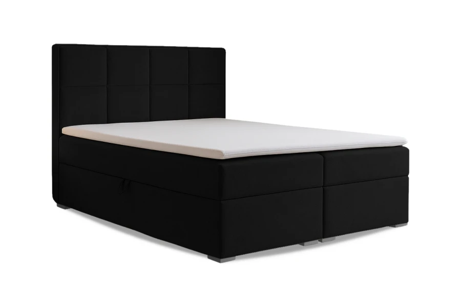 Boxspringbett Caro in Schwarz mit gepolstertem Kopfteil vor weißem Hintergrund.