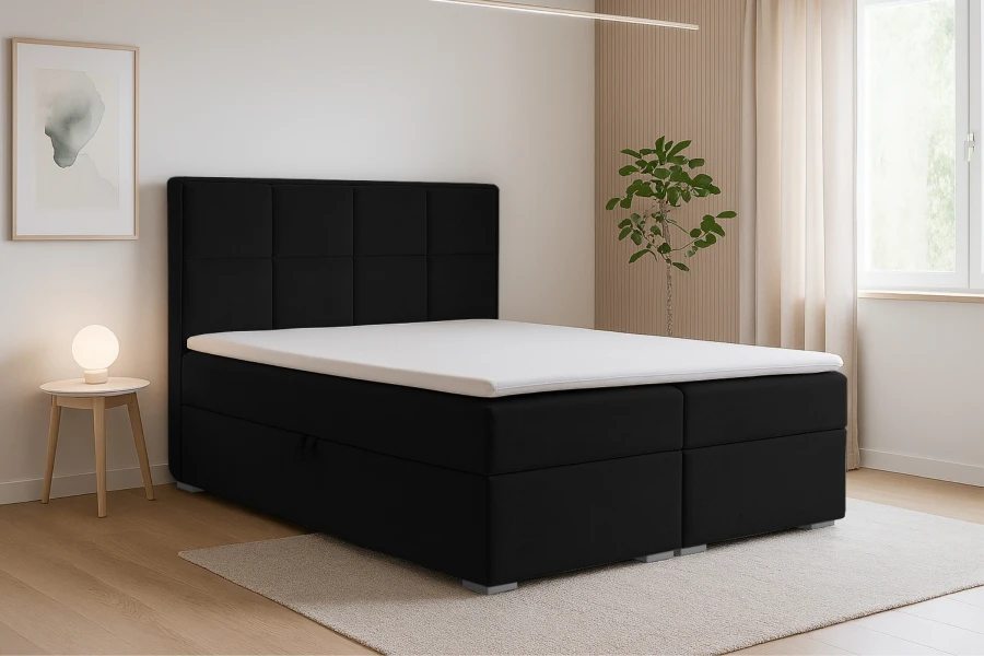 Schwarzes Boxspringbett Caro in einem modern eingerichteten Schlafzimmer.