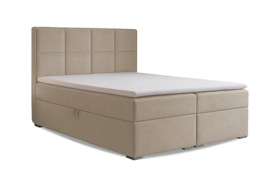 Beiges Boxspringbett mit hohem Kopfteil und weißem Topper, isoliert auf Weiß