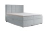 Modernes hellblaues Boxspringbett mit gestepptem Kopfteil auf weißem Hintergrund.