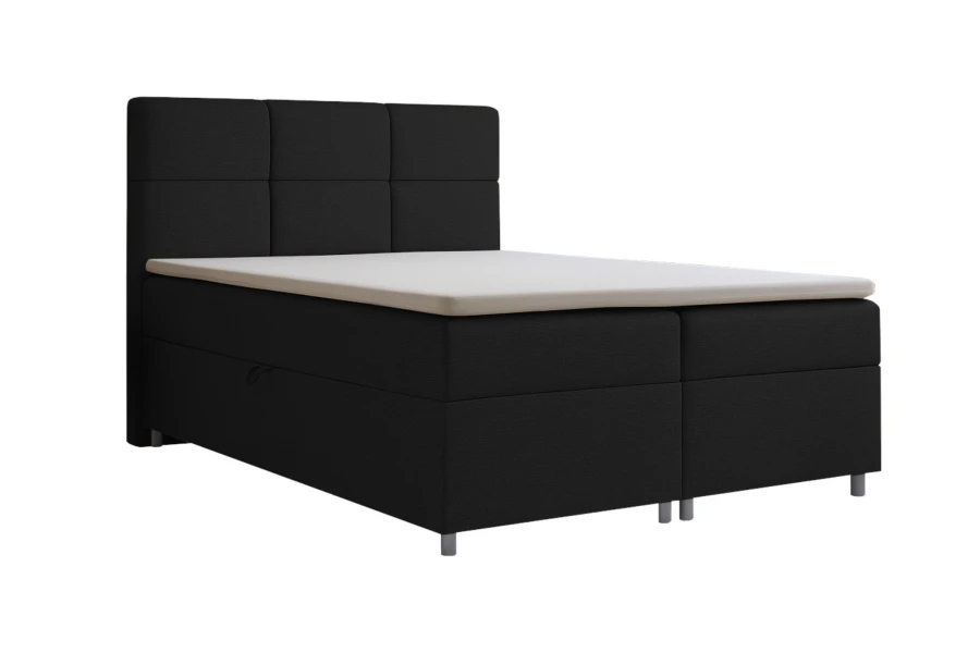 Modernes Boxspringbett in Anthrazit mit Topper, freigestellt vor weißem Hintergrund.