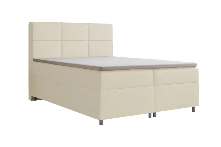 Modernes Boxspringbett in Creme mit gestepptem Kopfteil auf weißem Hintergrund.