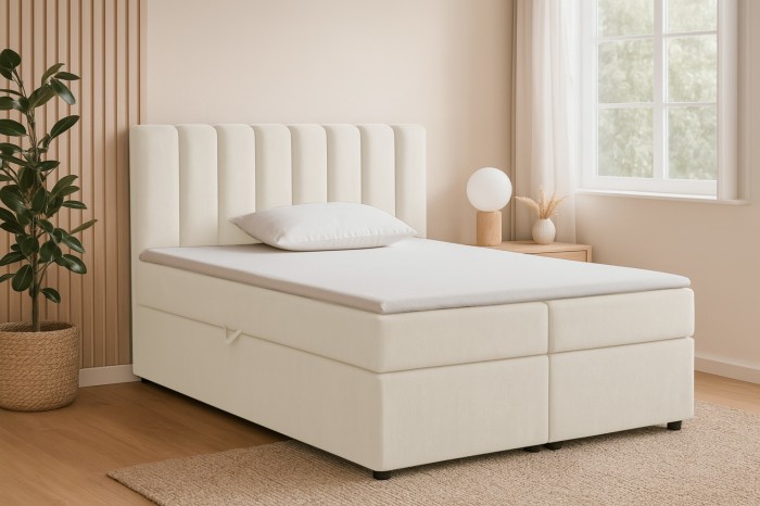 Modernes beiges Boxspringbett VIKA mit hohem, vertikal gestepptem Kopfteil im Schlafzimmer.