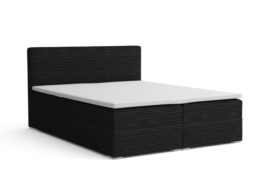 Boxspringbett in Dunkelgrau mit Topper und Cord-Optik freigestellt auf Weiß.