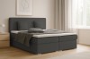 Modernes Schlafzimmer mit dunkelgrauem Boxspringbett Bello und passender Einrichtung.