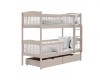 Beige bunk bed made of solid wood with two drawers on a white background.