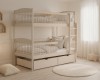 Beige bunk bed in a cosily furnished children's room with round rugs.