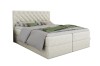 Beigefarbenes Boxspringbett mit elegantem Kopfteil und Kristallverzierung auf weißem Hintergrund.
