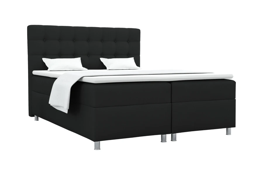 Schwarzes Boxspringbett mit gepolstertem Kopfteil und weißem Topper auf weißem Hintergrund.