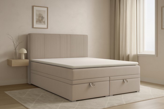 Beiges Daga Boxspringbett in einem hellen, modern eingerichteten Schlafzimmer