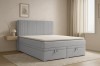 Daga Boxspringbett in Grau mit zwei praktischen Bettkästen und vertikal gestreiftem Kopfteil.