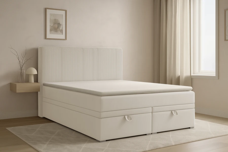 Modernes beige Boxspringbett Daga in einem hellen, gemütlich eingerichteten Schlafzimmer.