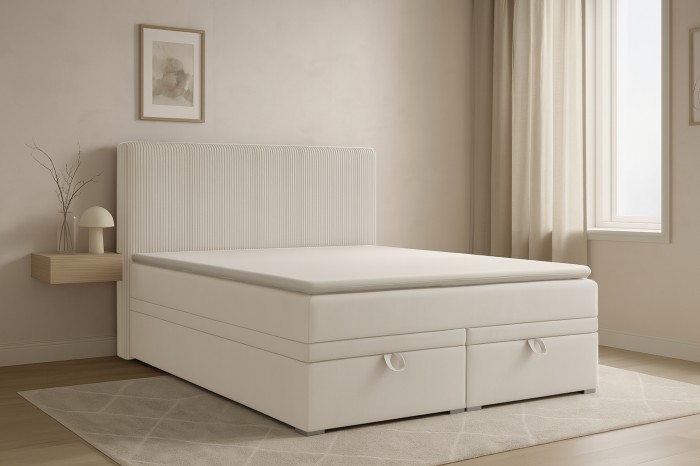 Stilvolles DAGA Boxspringbett in Beige in einem modern eingerichteten Schlafzimmer.