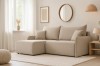Beiges Ecksofa in modern gestaltetem Wohnzimmer mit gemütlicher Atmosphäre