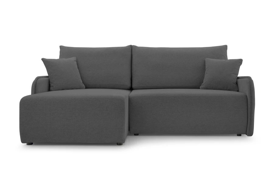 Modernes Ecksofa in Dunkelgrau mit Ottomane und Kissen vor neutralem Hintergrund.